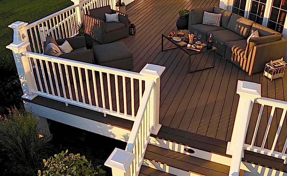 Deck Design Luxury furnished deck with staircase and white railings