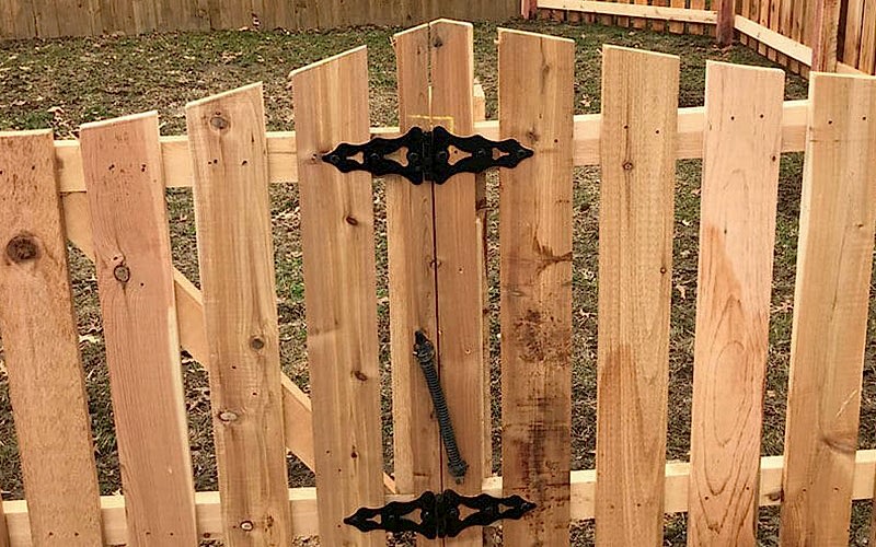 Fence Products Feature 2 Wood fence with metal hinges