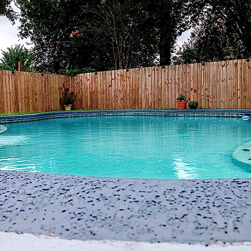Pool Fence Feature Wood fence around pool and patio