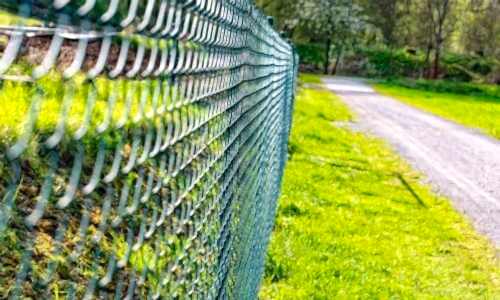 Chiainlink-lowmaintence-fence-500×300 Chain-link fence along road