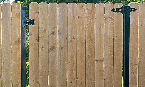 Fence Materials – Wood Fence Wood fence with gate